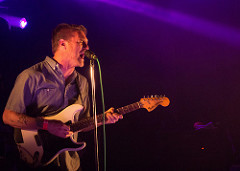 Cold War Kids Lead singer preforming on guitar.